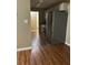 Bright kitchen with stainless steel refrigerator and hardwood flooring at 159 Parkside Dr, Stockbridge, GA 30281
