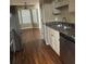 Kitchen features stainless steel appliances, granite countertops and a breakfast nook at 159 Parkside Dr, Stockbridge, GA 30281