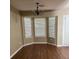 Bright living room featuring a chandelier and hardwood floors at 159 Parkside Dr, Stockbridge, GA 30281