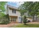 Two-story home with siding, seen from the backyard, featuring a patio at 179 Parkside Dr, Stockbridge, GA 30281