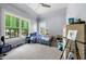 Cozy bedroom with large windows offering plenty of natural light and a ceiling fan for added comfort at 3278 Shakerley Park, Douglasville, GA 30135