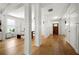 Inviting entryway with hardwood floors, shiplap walls, and views of the dining area at 3278 Shakerley Park, Douglasville, GA 30135
