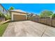 A one-car garage featuring a private driveway at 3278 Shakerley Park, Douglasville, GA 30135