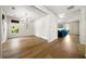 Bright living room with hardwood floors, shiplap walls, and modern chandelier at 3278 Shakerley Park, Douglasville, GA 30135