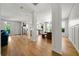 Open concept living area with hardwood floors, stylish columns, and bright, airy feel at 3278 Shakerley Park, Douglasville, GA 30135
