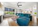 Spacious living area with a comfortable couch, fireplace, and seamless transition to the kitchen at 3278 Shakerley Park, Douglasville, GA 30135