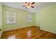 Bedroom with natural light and beautiful hardwood floors throughout at 3627 Pebble Hill Ne Dr, Marietta, GA 30062