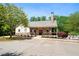 Inviting clubhouse with covered porch, accessible ramp, and convenient parking for residents' enjoyment at 3627 Pebble Hill Ne Dr, Marietta, GA 30062