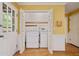 Convenient laundry closet featuring a washer and dryer, plus extra storage at 3627 Pebble Hill Ne Dr, Marietta, GA 30062