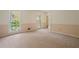 Cozy living room with carpet flooring and natural light from multiple windows at 3627 Pebble Hill Ne Dr, Marietta, GA 30062