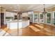 Spacious kitchen features stainless steel appliances and a large island with granite countertops at 470 W Magnolia Cir, Johns Creek, GA 30005
