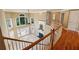 View of the living room with a fireplace and large windows at 470 W Magnolia Cir, Johns Creek, GA 30005