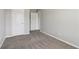 Cozy bedroom featuring neutral walls and soft carpeting, offering a blank canvas for personalization and comfort at 7712 Autry Circle # 204, Douglasville, GA 30134