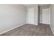 Comfortable bedroom featuring neutral walls and soft carpeting, perfect for creating a personalized and relaxing space at 7712 Autry Circle # 204, Douglasville, GA 30134