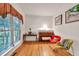 Bright living room featuring hardwood floors, a large window, and comfortable seating at 2262 Silver Fox Ln, Buford, GA 30519