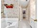Large main bathroom with walk-in shower, closet, and soaking tub at 2262 Silver Fox Ln, Buford, GA 30519