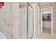 Walk-in shower with glass door and storage at 2262 Silver Fox Ln, Buford, GA 30519