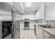 Well-equipped kitchen with stainless steel appliances, white cabinets, and ample counter space for meal preparation at 603 Spring Heights Se Ln # 6, Smyrna, GA 30080