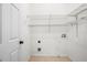 Functional laundry room featuring wire shelving and ample space for laundry tasks, providing added convenience at 603 Spring Heights Se Ln # 6, Smyrna, GA 30080