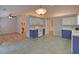 The kitchen boasts plenty of counter space, a ceiling fan, and a great layout at 1080 Smoke Hill Ln, Hoschton, GA 30548