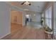 Living room featuring a neutral color scheme and luxury vinyl plank flooring at 1080 Smoke Hill Ln, Hoschton, GA 30548