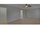 This main bedroom boasts great natural light and convenient access to the en suite bathroom at 1080 Smoke Hill Ln, Hoschton, GA 30548
