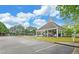 Community pool area with covered seating, parking, and recreational facilities at 1080 Smoke Hill Ln, Hoschton, GA 30548