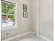 Cozy bedroom with a large window overlooking the swimming pool and backyard at 5605 Preserve Cir, Johns Creek, GA 30005