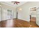 Spacious bedroom features large windows and hardwood floors, creating a serene and comfortable atmosphere at 5605 Preserve Cir, Johns Creek, GA 30005