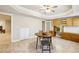 Spacious dining area with wood table, desk area, and built-in cabinets, perfect for entertaining at 5605 Preserve Cir, Johns Creek, GA 30005