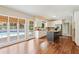Well-lit kitchen features stainless appliances, granite countertops, and a large central island at 5605 Preserve Cir, Johns Creek, GA 30005