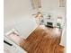 Bright living room boasts hardwood floors, fireplace, neutral color scheme and plentiful natural light at 5605 Preserve Cir, Johns Creek, GA 30005