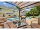 Outdoor pool with a cozy lounge area with seating and a fire pit, perfect for outdoor gatherings at 5605 Preserve Cir, Johns Creek, GA 30005