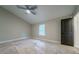 Bedroom featuring neutral paint, carpeted floors, and a ceiling fan at 1329 Hidden Hills Pkwy, Stone Mountain, GA 30088