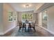 Eat in dining area with bright light from the windows and an open floor plan at 1329 Hidden Hills Pkwy, Stone Mountain, GA 30088