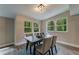 Eat in dining area with bright light from the windows and an open floor plan at 1329 Hidden Hills Pkwy, Stone Mountain, GA 30088