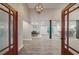Grand entryway showcasing high ceilings, modern lighting, and an open floor plan perfect for entertaining at 1329 Hidden Hills Pkwy, Stone Mountain, GA 30088