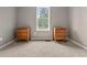 Bedroom with carpet, neutral walls, natural light, and two wooden dressers at 148 White Pine Ln, Temple, GA 30179