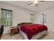 Bedroom with carpet, natural light, ceiling fan, neutral walls, and large windows at 148 White Pine Ln, Temple, GA 30179