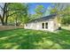 Nice view of backyard of white home and fenced in yard at 1921 Hazelwood Se Dr, Marietta, GA 30067