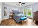 Bedroom with natural light, modern furnishings, and wood-look flooring at 1921 Hazelwood Se Dr, Marietta, GA 30067