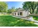 Charming white cottage-style home with wood shutters and a well-maintained lawn at 1921 Hazelwood Se Dr, Marietta, GA 30067
