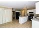 Spacious kitchen featuring an island, white cabinets, and stainless steel appliances at 1960 Mceachern Manor Sw Dr, Marietta, GA 30064