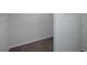 Walk in closet with metal racks and brown carpet at 420 Tavistock Ct, Mcdonough, GA 30252