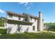 Home exterior showcasing back yard, patio, and siding at 3656 Oak Sw Ln, Powder Springs, GA 30127