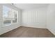 Cozy bedroom featuring large window and plush carpet at 3656 Oak Sw Ln, Powder Springs, GA 30127