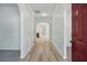 Inviting foyer with hardwood floors and modern white trim at 3656 Oak Sw Ln, Powder Springs, GA 30127