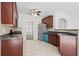Modern kitchen with stainless steel appliances, tile backsplash, and sleek countertops at 3656 Oak Sw Ln, Powder Springs, GA 30127