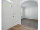 Bright living room with new carpets, decorative trim and white painted walls at 3656 Oak Sw Ln, Powder Springs, GA 30127