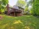 Large backyard with a deck, perfect for outdoor entertaining and enjoying the expansive green space at 351 Ridgewater Dr, Marietta, GA 30068
